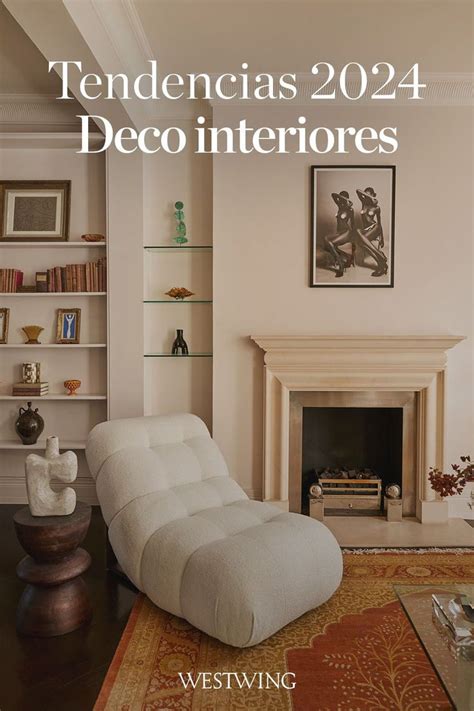 A Living Room Filled With Furniture And A Fire Place In Front Of A Book Shelf