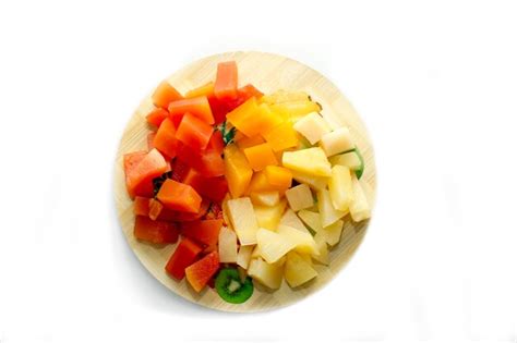 Premium Photo | Fruit salad on a white background