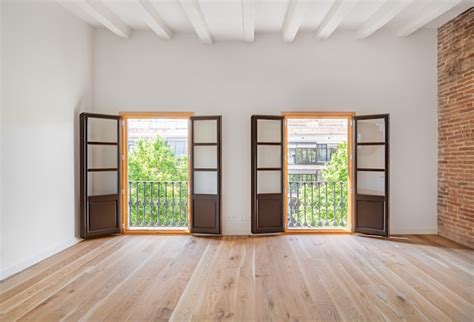 Premium Photo Empty Room With Wooden Floor And Two Balconies