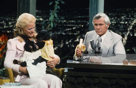 Enviromentalist Joan Embery With Host Johnny Carson Holding A Chimp