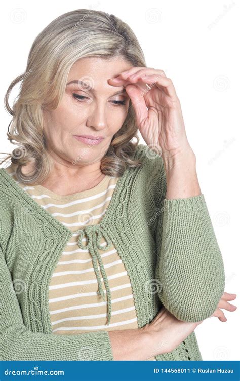 Close Up Portrait Of Sad Mature Woman Posing On White Background Stock