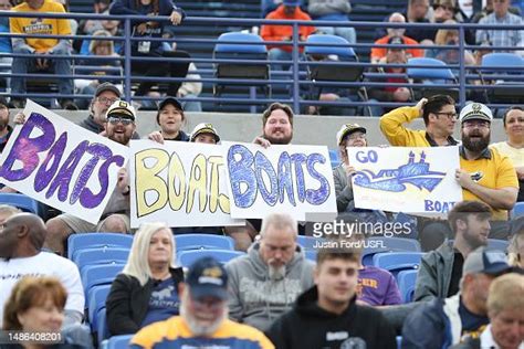 Memphis Showboats Fans Hold Signs From The Stands Prior To The Game