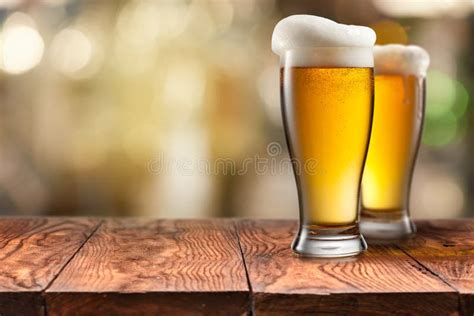 Two Glass Of Beer On Wooden Table Stock Image Image Of Full Lager 101502259