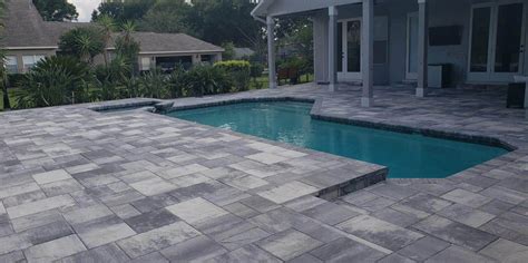 Brick Pavers Vs Travertine Which Is Best For Your Pool Deck