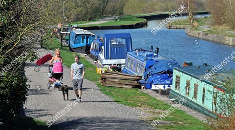 Narrowboats Moored On Leeds Liverpool Canal Editorial Stock Photo