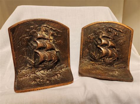 Cast Iron Bookends and cautionary tale | Antiques Board