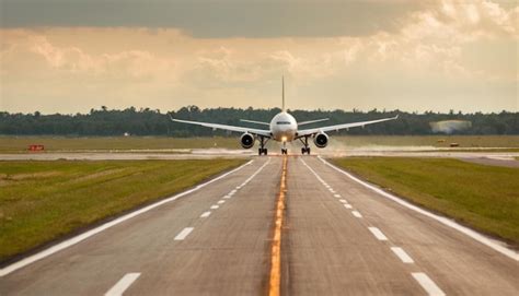 premium photo commercial airplane takes    runway