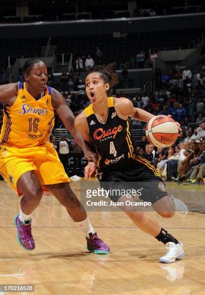 Skylar Diggins Of The Tulsa Shock Drives Against Ebony Hoffman Of The