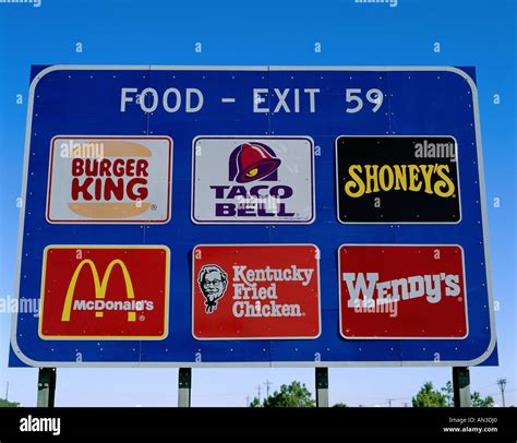 Tupical highway exit sign advertising fast food hi-res stock ...