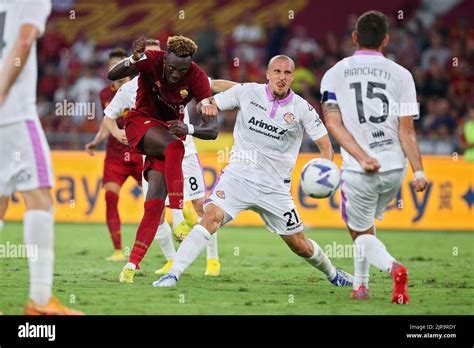 Tammy Abraham Of Roma L Kicks The Ball Under Pressure From Vlad