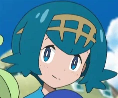 An Anime Character With Blue Hair And Green Eyes