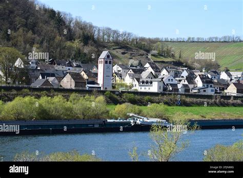 Mosel Valley Village Lehmen With A Ship Waiting For The River Lock