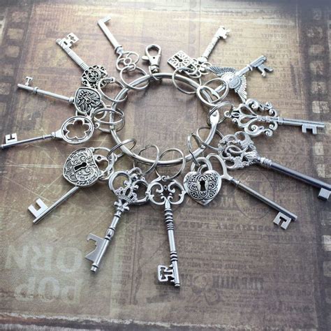 Set Of Large Skeleton Keys With Locks On A Big Ring Antique Silver