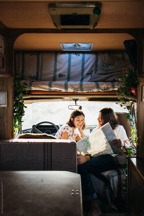 Couple Planning A Road Trip By Stocksy Contributor Marc Bordons Stocksy