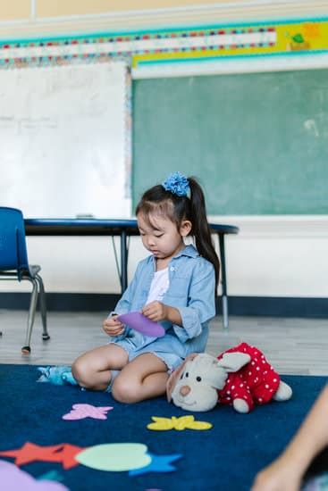 A Girl Playing with Toys at the School - Photos by Canva