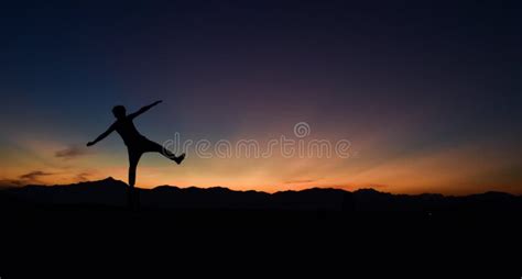 Silhouette Of Man Doing Walking At Sunset Stock Image Image Of