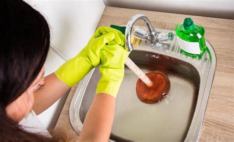 How to Unclog a Kitchen Sink with Standing Water - Kitchen Crawlers