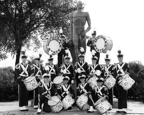 On The Banks Of The Red Cedar Marching Band Drum Section Posing With