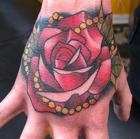 Hand Rose By Ricky Smith MADISON TattooNOW