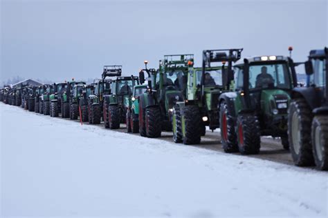 German Farmers Block Roads With Tractors In Protest Of Plan To Scrap