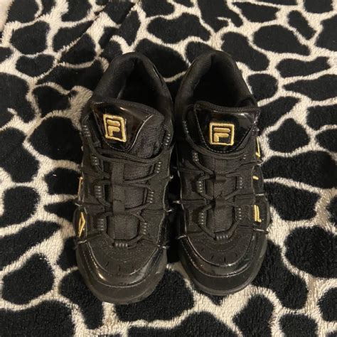 Fila Women S Black And Gold Depop