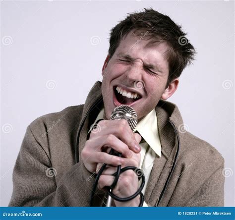 Guy singing stock image. Image of intense, microphone - 1820231