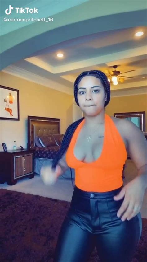 Hot Carmen Pritchett Shows Cleavage In Electric Orange Top Sexyfilter