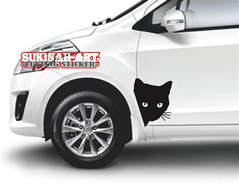 CUTTING STICKER MOBIL STICKER LUCU KEPALA KUCING SEDANG MENGINTIP