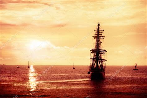 Pirate ship sailing in the sunset — Stock Photo © plrang #5841234