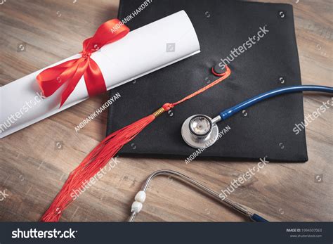 Diploma Graduation Hat Stethoscope On Wooden Stock Photo 1994507063