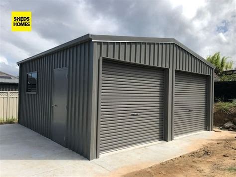 A warm and earthy mid grey, #COLORBOND Wallaby® on a classic 6m x 6m shed | Garage prices, Car ...