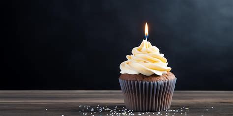 Premium Photo A Cupcake With A Lit Candle