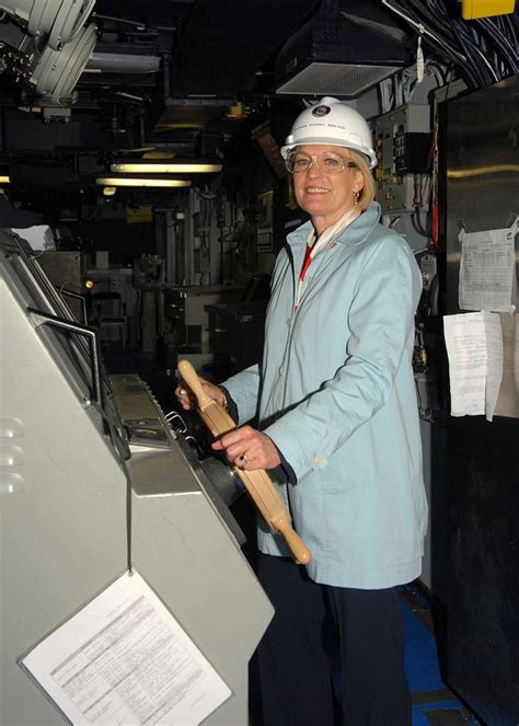 Susan Ford Bales, daughter of President Gerald R. Ford, stands at the helm of the aircraft ...