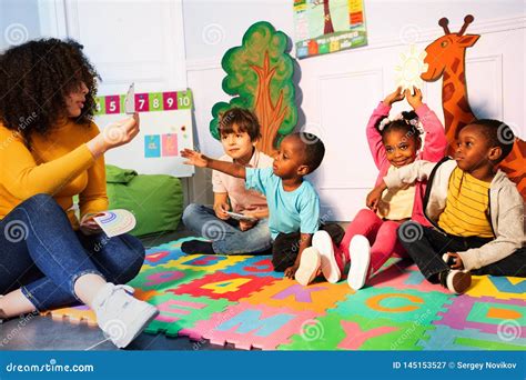 kids  kindergarten play games  teacher stock image image