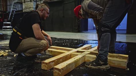 assembly  wooden stage construction  young builders media stock