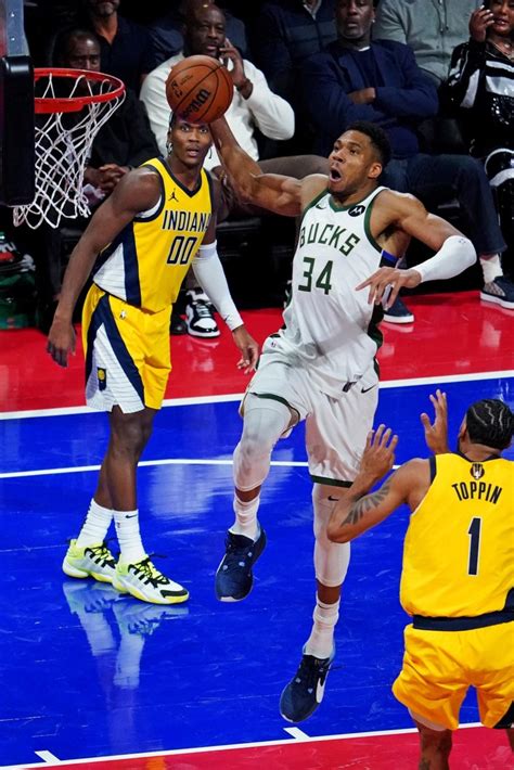 Milwaukee Bucks Forward Giannis Antetokounmpo 34 Dunks The Ball Against Indiana Pacers Forward