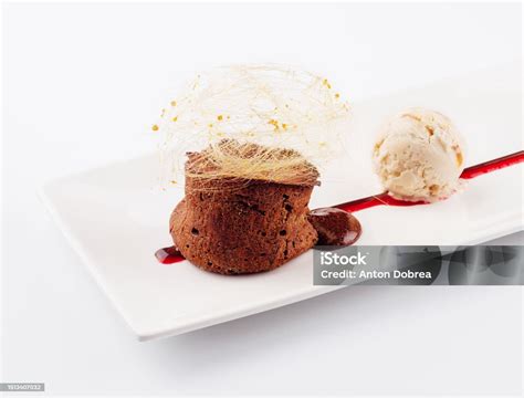 Chocolate Volcano With Vanilla Ice Cream Stock Photo Download Image