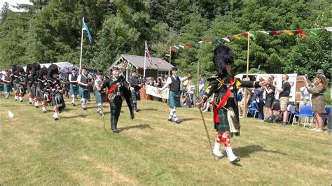 Drum Major Leads The Massed Pipe Bands Off After Opening March Of 2023