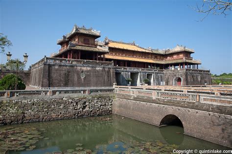 Bridge Over The Moat Leading To Ngo Mon Gate With Five Phoenix