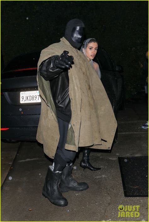 Kanye Wests Wife Bianca Censori Braves The Rain In See Through Poncho With Nothing Underneath