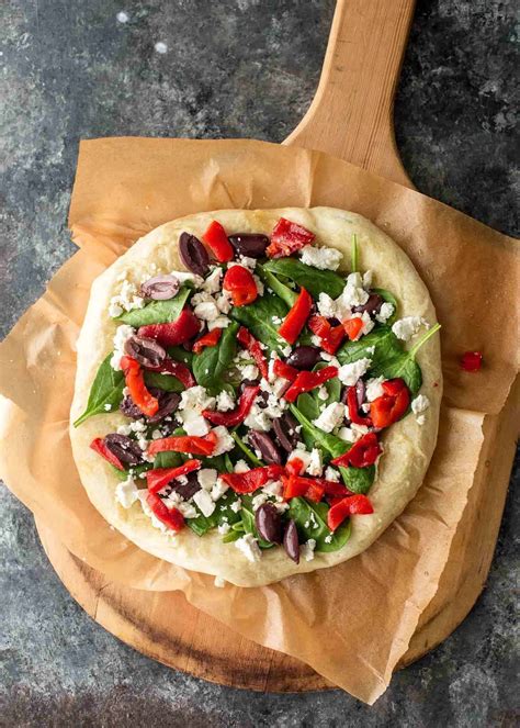 Greek Pizza With Feta Spinach And Olives Greek Pizza Pizza Recipes