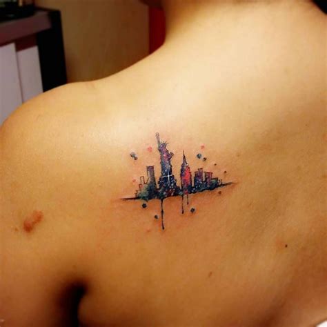 Stunning Watercolor New York Skyline Tattoo