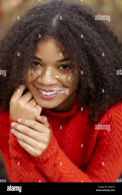 Young Happy Overjoyed African American Woman With Curly Hair Keeping