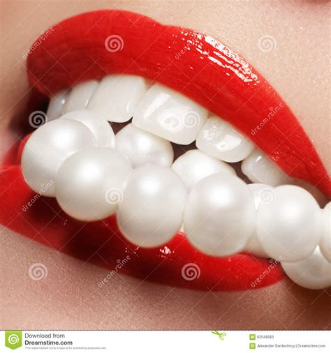 Close Up Beauty Portrait View Of A Young Woman Natural Smile With Red