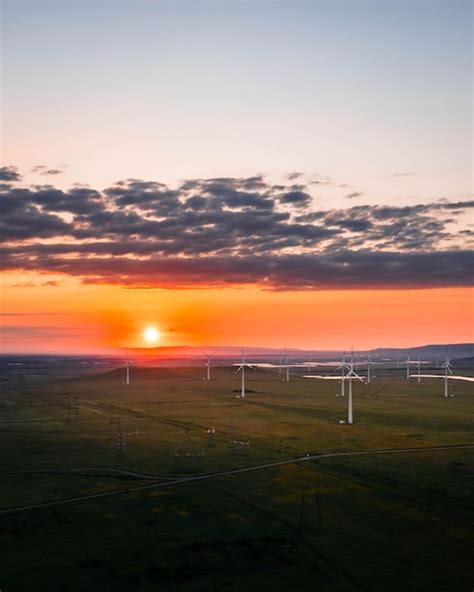 Premium Photo Wind Turbine Farm At Sunset Renewable Energy Concept