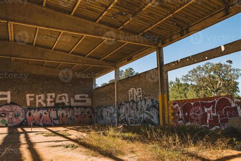 Abandoned warehouse with graffitis 21829920 Stock Photo at Vecteezy