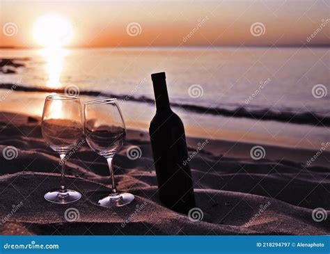 Wine Glasses With Red Wine On Sand On The Beach Stock Image Image Of