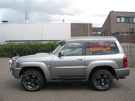 Zonneklep Nissan Patrol Y61 2006 Vosca