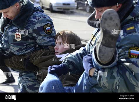 Police Arrests One Of The Activists On Picket To Free Pussy Riot Members On March 8 2013 Stock