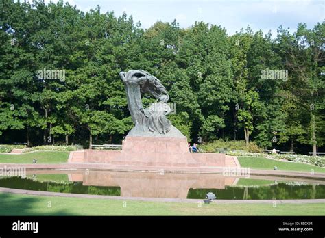 Lazienki park Chopin Frederik memorial monument Stock Photo - Alamy